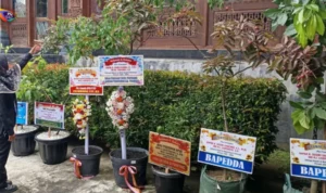 ganti karangan bunga